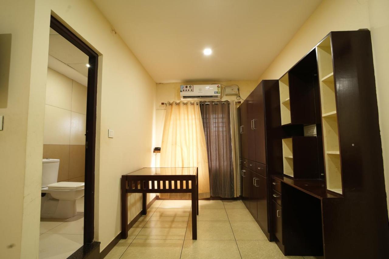 K V Suites Kochi Kültér fotó