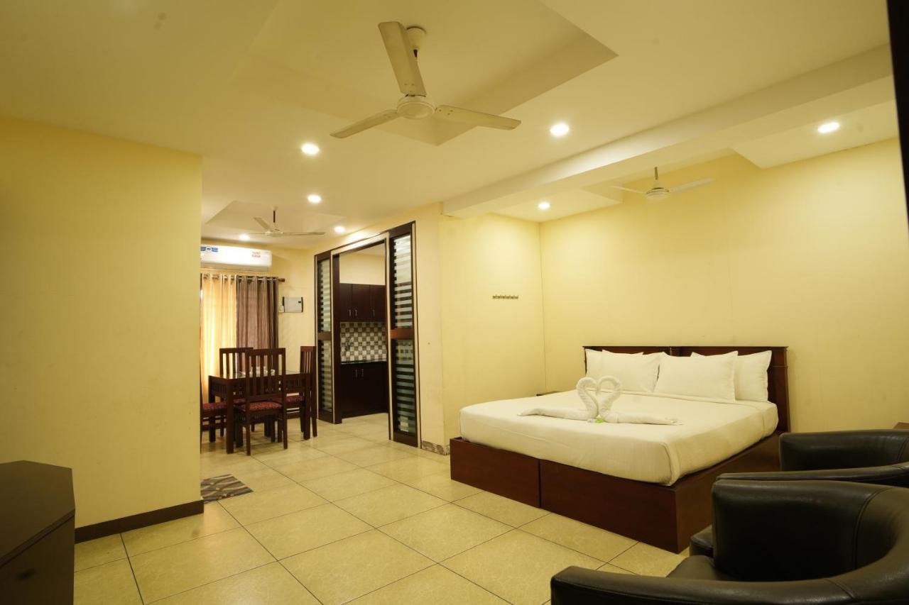K V Suites Kochi Kültér fotó