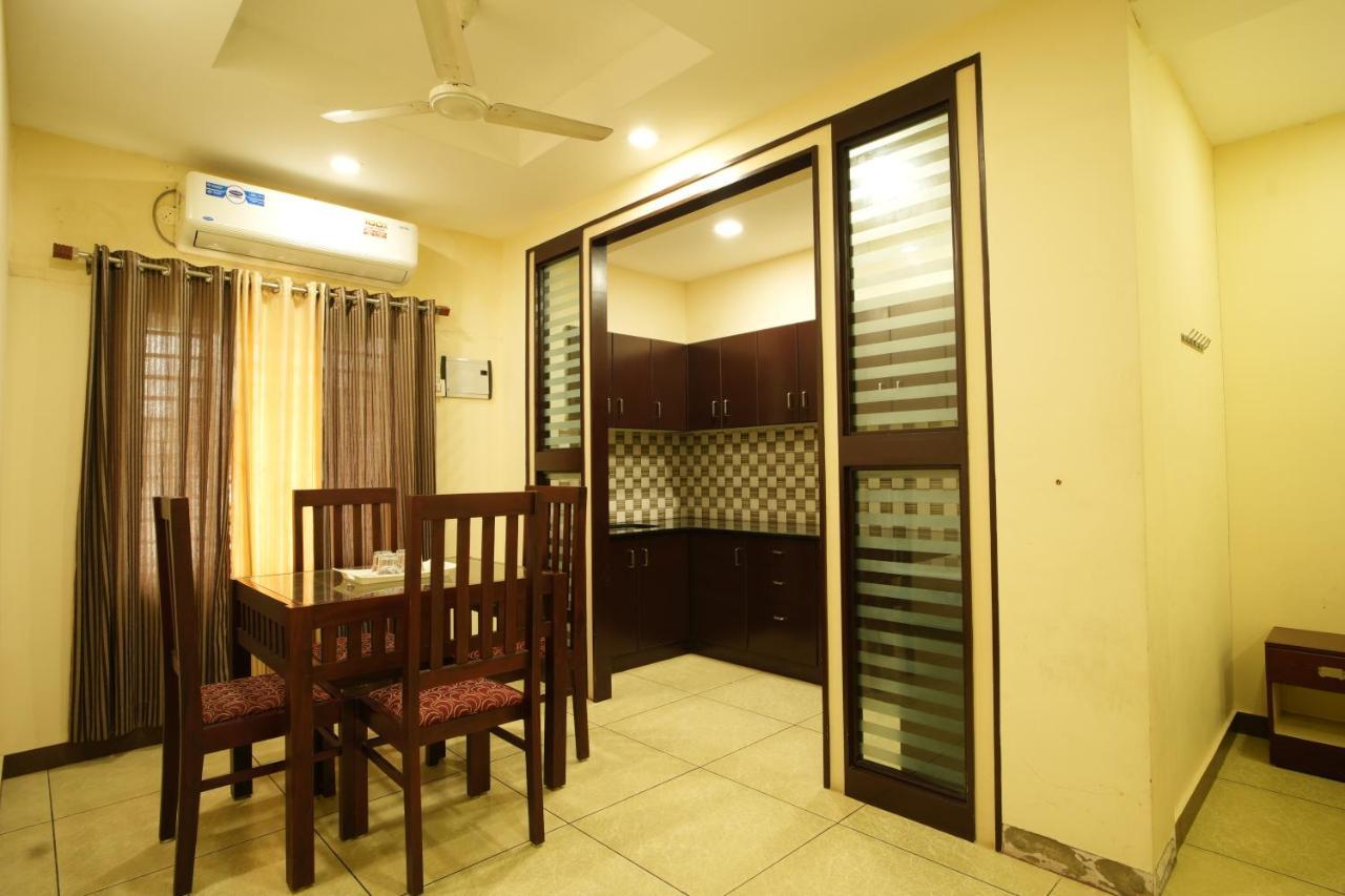 K V Suites Kochi Kültér fotó